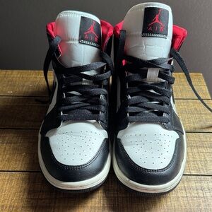 Women’s Air Jordan 1 Mid Sneaker in Black/Gym Red. Women’s Size 9.5 Men’s 8